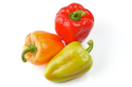 Red, Orange and Green  Bell Peppers isolated on white background
