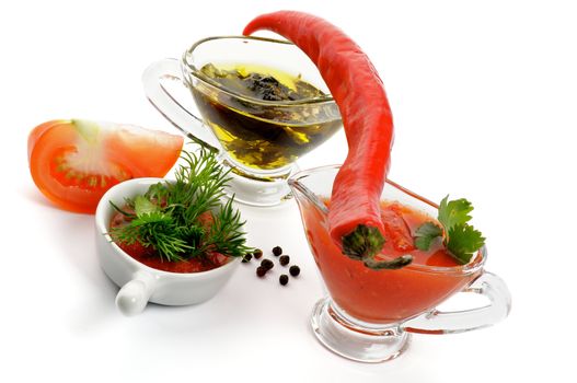 Arrangement Tomato, Chili Pepper, Greens, Salsa Sauce and Olive Oil with Herbs isolated on white background 