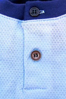 A part of a shirt with buttons