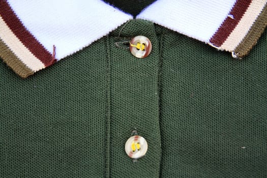 A part of a shirt with buttons