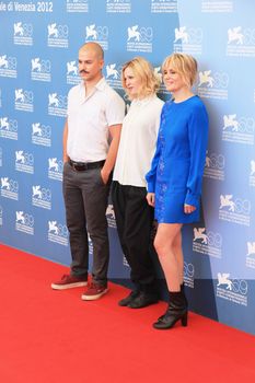 Marc Andre Grondin, Christa Theret and Emmanuelle Seigner pose for photographers at 69th Venice Film Festival