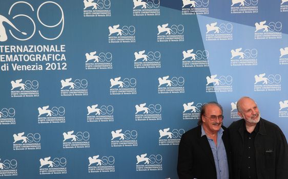 Pino Donaggio and Brian De Palma pose for photographers at 69th Venice Film Festival