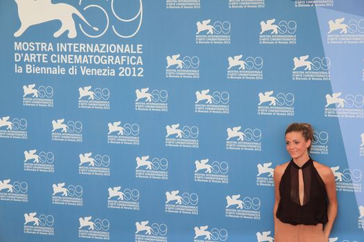 Giulia Valentini poses for photographers at 69th Venice Film Festival