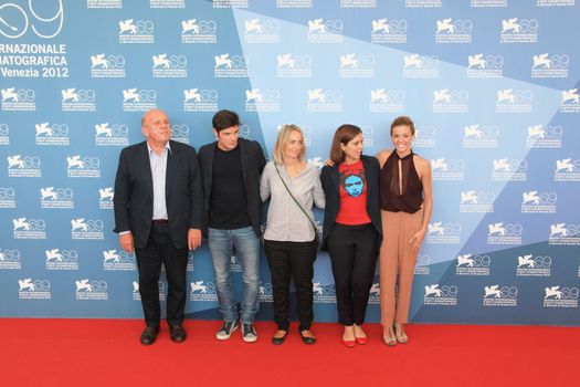 Giulia Valentini and Filippo Scicchitano pose for photographers at 69th Venice Film Festival