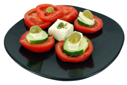 Decorative salad with cheese,olives,tomatoes and cucumber