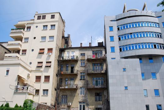 Old building between modern architecture