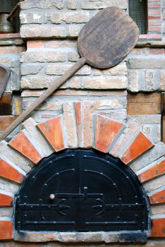 Old bakery brick stove with peel