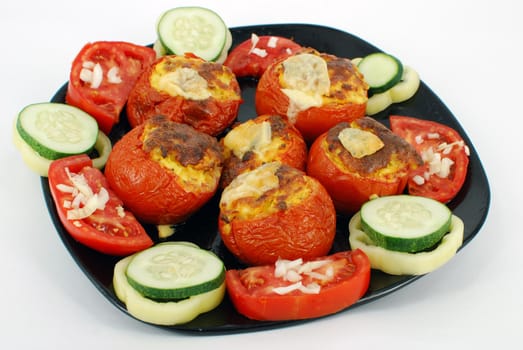 Baked tomatoes with cheese and eggs fill inside