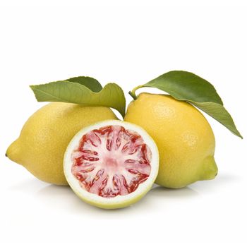 A lemon mixed with tomato isolated on a white background.