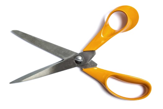 Yellow scissors isolated on white background