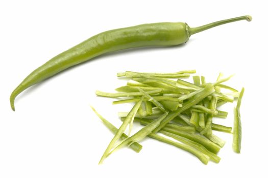Fresh green chili close up on white background