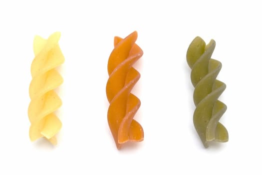 Colorful pasta closeup on white background 

