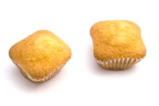 Delicious muffins isolated on white background