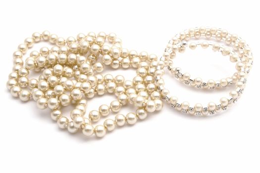 Beautiful Bracelet and necklace isolated on white background 