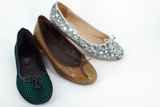 Woman ballet flat shoes on white