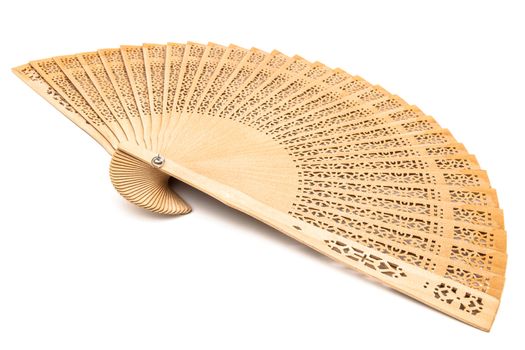 A wood spanish fan on a white background