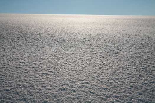 Details of a beautiful snow surface perfect for backgrounds on greeting cards etc.