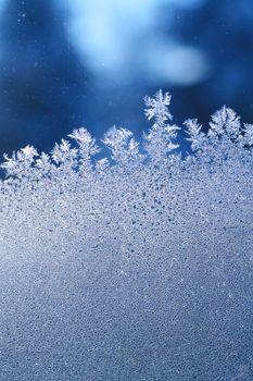 The patterns made by the frost on the window (hoarfrost background)