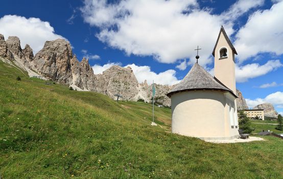 small chapel beneath Cir Dolomites in Gardena pass, Italy