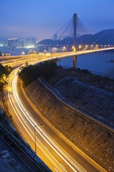 Ting Kau Bridge and highway at night in Hong Kong