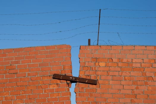 Red broken brick wall 
