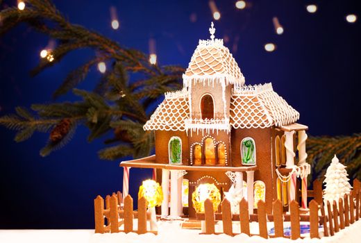 picture of gingerbread house over christmas background