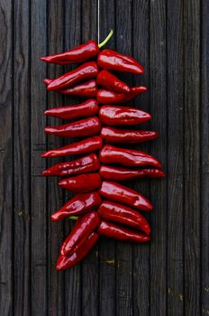 Espelette peppers hanging at a door