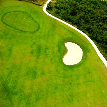 Flying above a golf course at an exotic destination