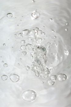 Water with air bubbles in the water line. 