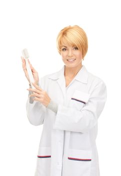 picture of attractive female doctor with toothbrush