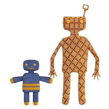 Copies of old mechanical tin toys with a wind up key in the form of stylised figures of an adult and child holding hands isolated on a white background