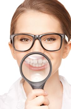 picture of woman with magnifying glass showing teeth