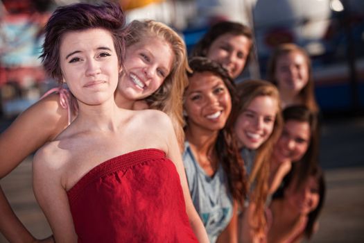 Good group of friends smiling together outdoors