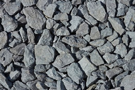 Many grayish scree stones as a background