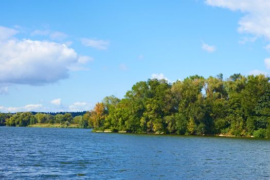 Beautiful scenery with river in early autumn