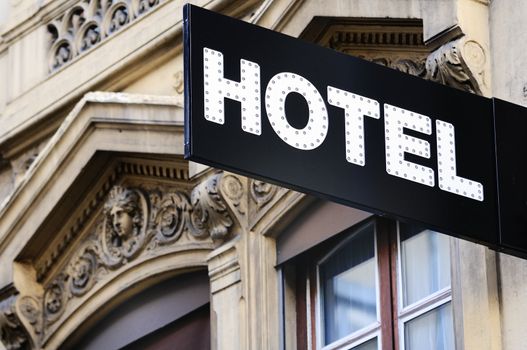 Illuminated urban hotel sign