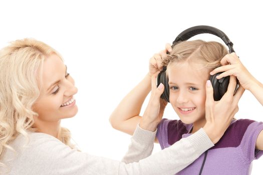 picture of mother and little girl with headphones