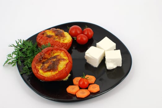 Domestic cooked baked tomatoes with cheese