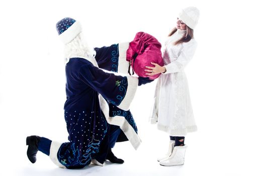 Santa Claus with her granddaughter prepare to greet the new year