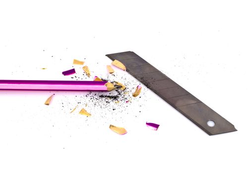 pencil and sharpener with a blade