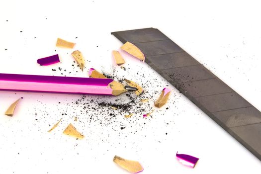pencil and sharpener with a blade