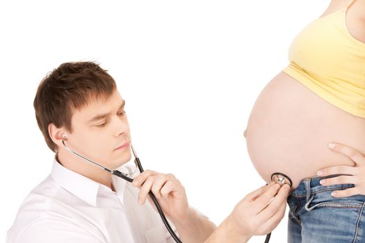 bright closeup picture of doctor and pregnant woman belly