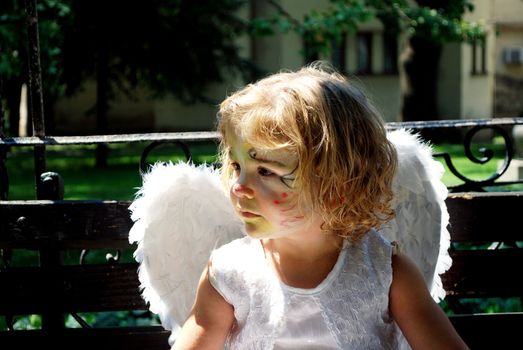 Little white angel child portrait