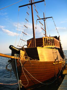 Wooden schooner on a mooring at the sea