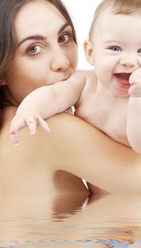 picture of happy mother with baby in water