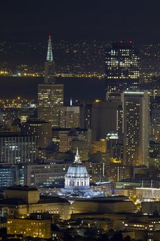 San Francisco City Hall with Skyline Skyscrapers at Night Background