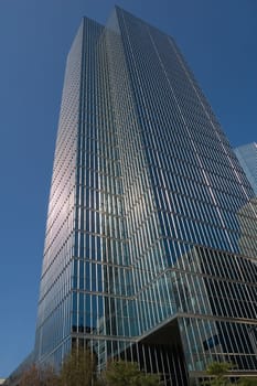 glass wall of a high-rise building in downtown Toronto