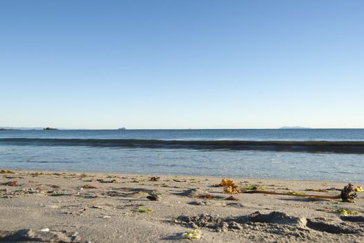 Beach, sea and sky create an idyllic background scene.