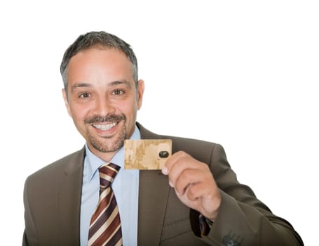 Portrait of happy businessman holding a credit crad on white background.