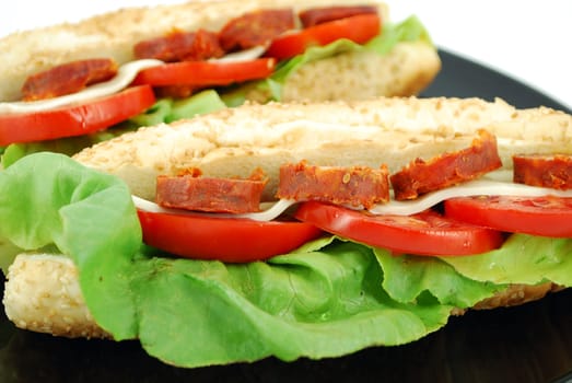 Sandwich with sausage and cheese close detail